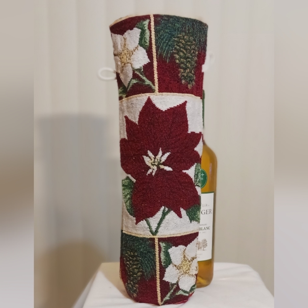 Gift Wine Bottle Cover Featuring Needlepoint Style Holiday Poinsettia Design.